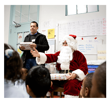 2007: Santa Handing Out Gifts